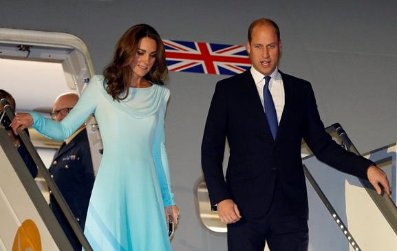 Prince William and Kate coming out from jet landed at Nur khan Air base near Islamabad