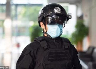 Chinese cops are using smart helmets to fight the coronavirus epidemic.