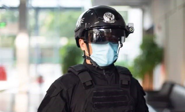 Chinese cops are using smart helmets to fight the coronavirus epidemic.