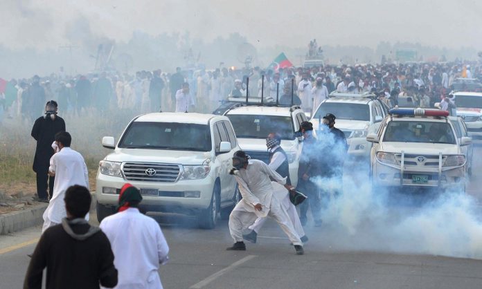 PTI Long March: PTI activists set fire to trees and vehicles in Islamabad.